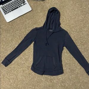 Navy blue thin top with a hoodie